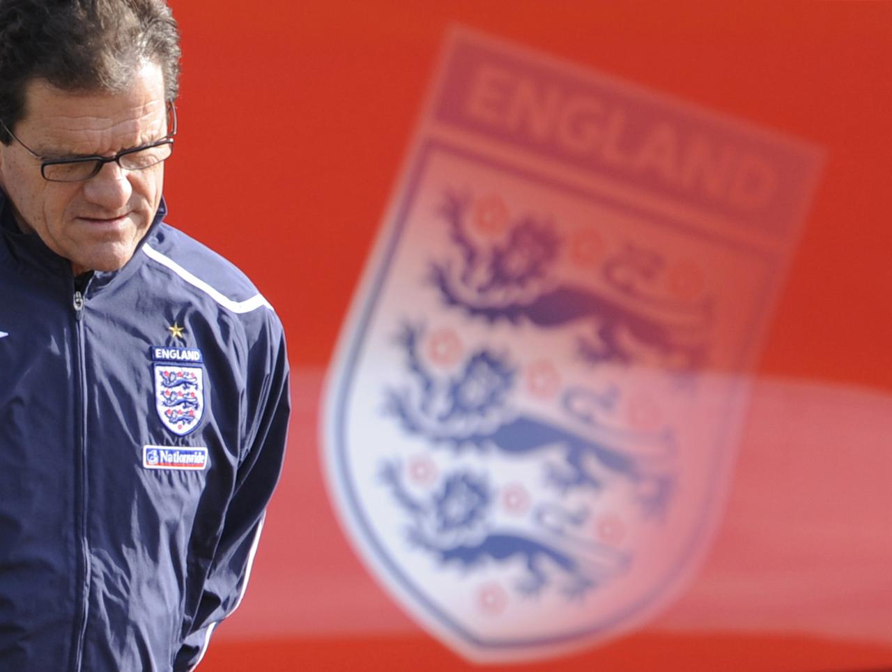 England soccer coach Fabio Capello arrives for a training session at London Colney near London October 10, 2008. England play Kazakhstan in a World Cup qualifying group match on Saturday. REUTERS/Toby Melville (BRITAIN) [Toby Melville]