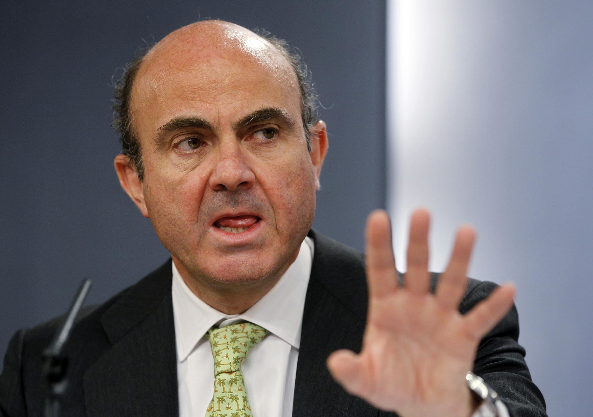 Le ministre espagnol de l'Economie, Luis de Guindos, veut attendre les résultats des audits avant de se prononcer sur un montant de l'aide européenne. [Reuters - Susana Vera]