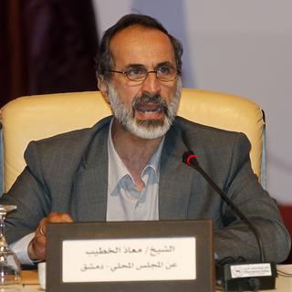 Cheikh Ahmad Moaz Al-Khatib prend la tête de la nouvelle coalition. [Mohammed Dabbous]