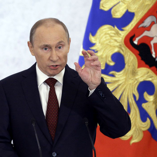 Vladimir Poutine défend une Russie forte et souveraine. [AP/Keystone - Alexander Zemlianichenko]
