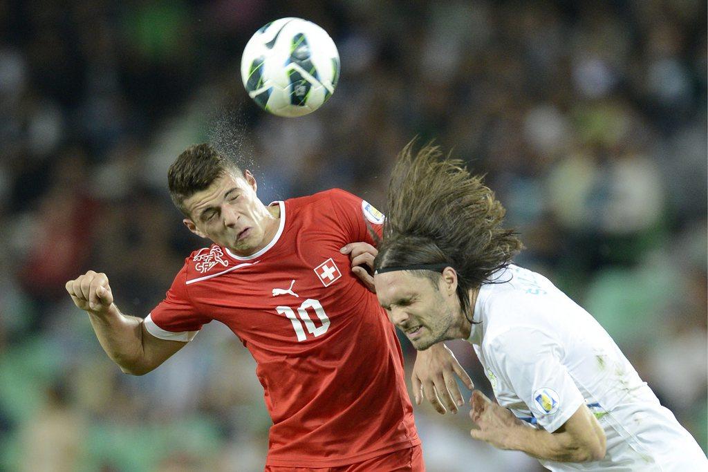 Granit Xhaka, plus jeune joueur de l'équipe (19 ans), a montré la voie à suivre. [Keystone - GEORGIOS KEFALAS]