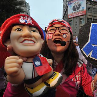 A Taipei, les soutiens du parti Guomindang célèbrent la victoire du candidat Ma Ying-Jeou. [Aaron Tam]