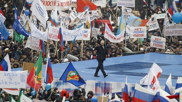 Devant ses partisans, Vladimir Poutine s'est présenté comme la seule garantie de stabilité pour la Russie. [Denis Sinyakov]