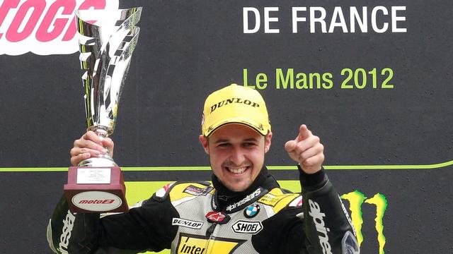 Moto2 rider Thomas Luthi of Swizerland reacts after winning the French MotoGP, in Le Mans, western France, Sunday, May 20 , 2012. Thomas Luthi crossed the finish line ahead of Claudio Corti of Italy in second and Scott Redding in third place. (AP Photo/Bob Edme) [Bob Edme]