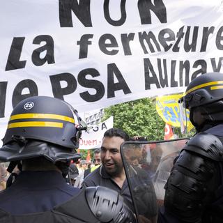 Les employés d'Aulnay-sous-Bois avaient déjà manifesté devant le siège de PSA à Paris le 28 juin dernier. [Bertrand Guay]