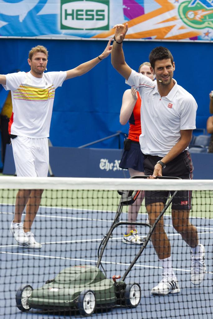 Plusieurs joueurs, dont Djokovic et Federer, se sont retrouvés dans la bonne humeur lors de la traditionnelle journée des enfants de l'US Open, samedi à New York. [KEYSTONE - Charles Sykes]
