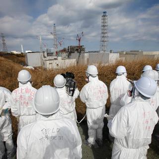 La catastrophe de Fukushima est classée au niveau 7 de l'échelle internationale des événements nucléaires - le plus élevé -, comme l'accident de Tchernobyl. Elle a créé une vive émotion à la fois au Japon et dans le monde. Depuis ce drame, la Suisse a décidé de sortir du nucléaire. [Issei Kato]