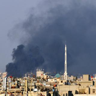 L'attentat visant le bâtiment de la Sécurité nationale à Damas a tué mercredi le ministre syrien de la Défense et le beau-frère de Bachar al-Assad. [AP Photo]