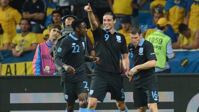 Welbeck, Carroll et Milner jubilent. L'Angleterre a fêté son premier succès de la compétition contre la Suède. [KEYSTONE - GEROGI LICOVSKI]