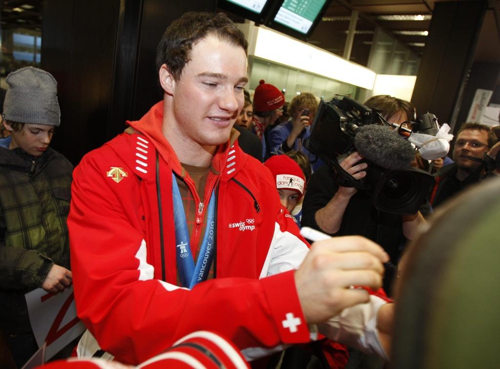 Dario Cologna est devenu champion olympique de 15 km libre en 2010 à Vancouver. [KEYSTONE - STEFFEN SCHMIDT]