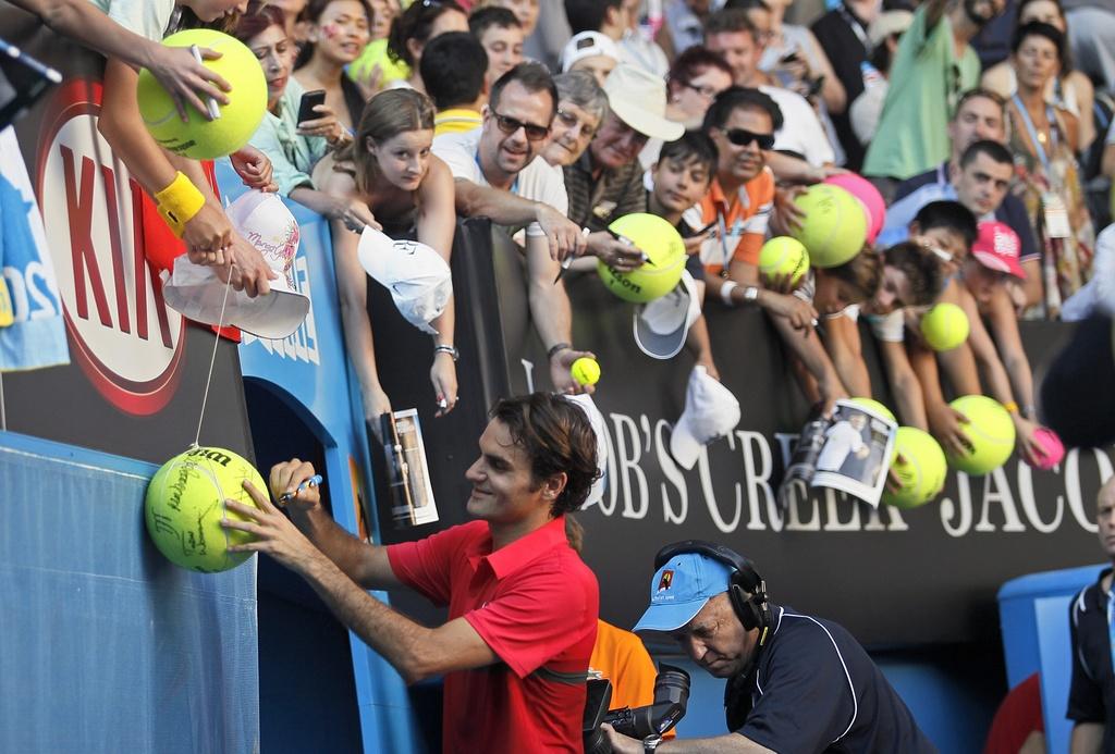 Roger Federer a pu apprécier une fois encore la grande popularité dont il jouit. [KEYSTONE - AHMAD YUSNI]