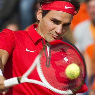 Roger Federer pendant son match face à Robin Haase sur la terre battue d’Amsterdam. [ANP - AFP - Toussaint Kluiters]