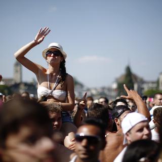 Le 11 août 2012, les rues de Zurich sont envahies par des centaines de milliers de danseurs pour la 21e Street Parade. [Michael Buholzer]
