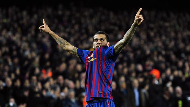 FC Barcelona's Daniel Alves, from Brazil reacts after scoring against Real Madrid during a quarterfinal, second leg, Copa del Rey soccer match at the Camp Nou stadium, in Barcelona, Spain, Wednesday, Jan. 25, 2012. (AP Photo/Manu Fernandez) [KEYSTONE - Manu Fernandez]