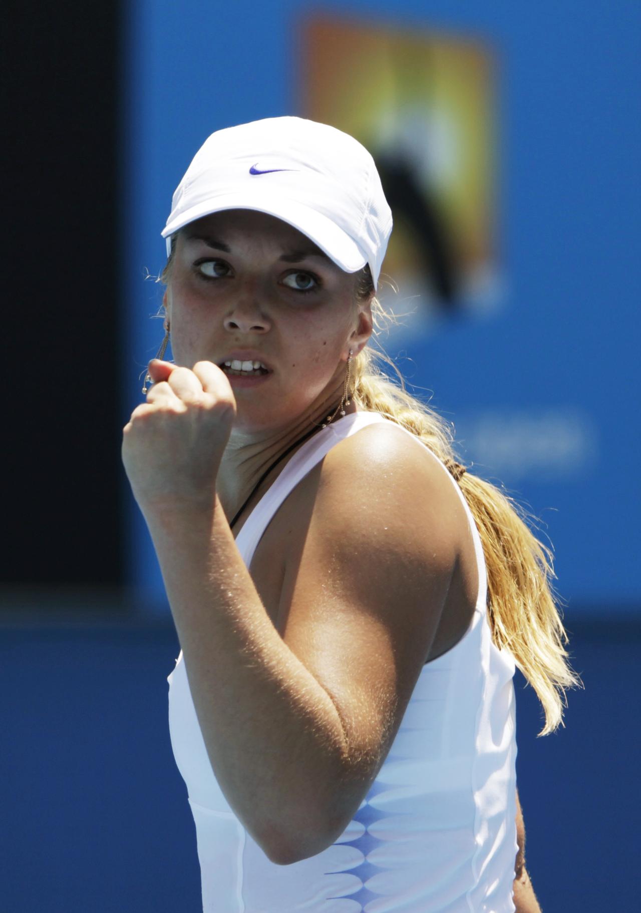 Sabine Lisicki of Germany reacts during her women's singles match against Stefanie Voegele of Switzerland at the Australian Open tennis tournament in Melbourne January 17, 2012. REUTERS/Darren Whiteside (AUSTRALIA - Tags: SPORT TENNIS) [D.Whiteside]