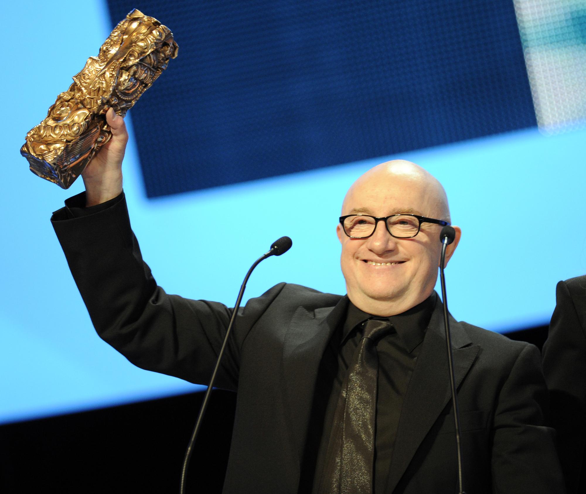 Michel Blanc a remporté son premier trophées après huit nominations. [AFP - AFP PHOTO / ERIC FEFERBERG]