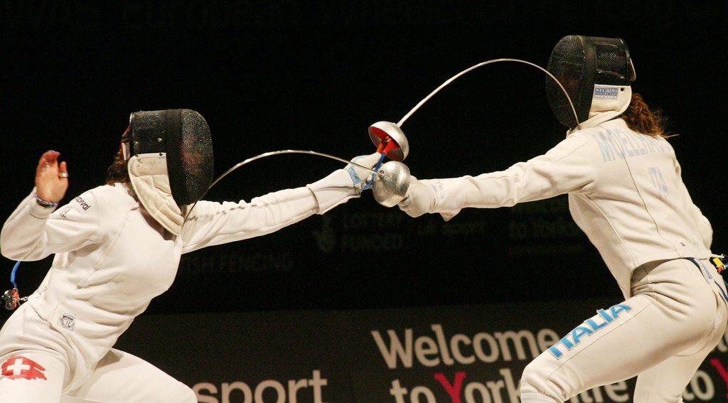 A Sheffield, Géroudet avait réussi un parcours remarquable. Outre la Française Laura Flessel-Colovic, la Valaisanne avait également dominé l'Italienne Nathalie Moellhausen (ici en photo) avant de battre l’Allemande Britta Heidemann en finale. [KEYSTONE - Lindsey Parnay]