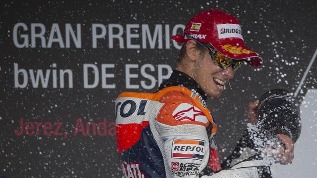 Casey Stoner sabrera le champagne à la maison dès l'année prochaine. [Miguel Angel Morenatti]