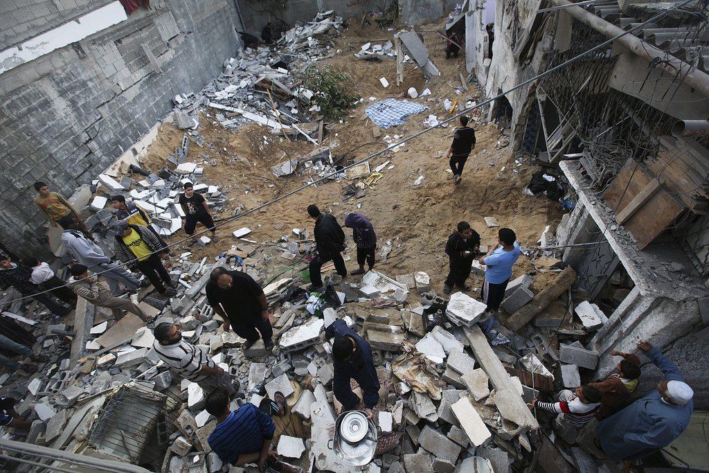 Neuf Palestiniens ont été tués mardi dans des raids israéliens. [KEYSTONE - Ali Ali]