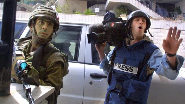 Le journaliste Gilles Jacquier (ici à droite) était reporter pour la chaîne télévisée française France 2. [AFP - Odd Andersen]