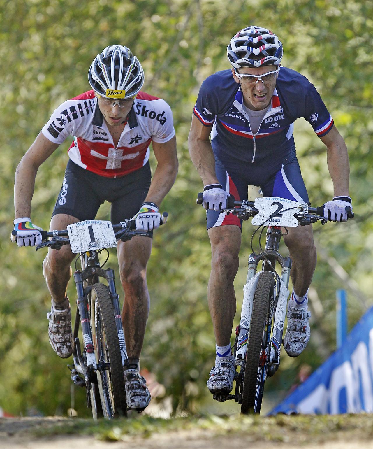 Schurter se méfiera tout particulièrement du Français Julien Absalon, double champion olympique. [Reuters - Mathieu Belanger]