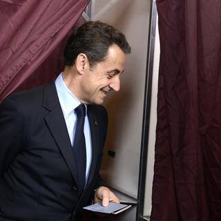 Nicolas Sarkozy a voté dans un bureau parisien [Eric Feferberg]
