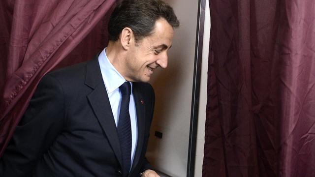Nicolas Sarkozy a voté dans un bureau parisien [Eric Feferberg]