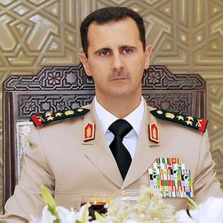 Bachar al-Assad serait entrain de préparer une riposte à l'attentat qui a notamment tué son beau-frère. [SANA HANDOUT]
