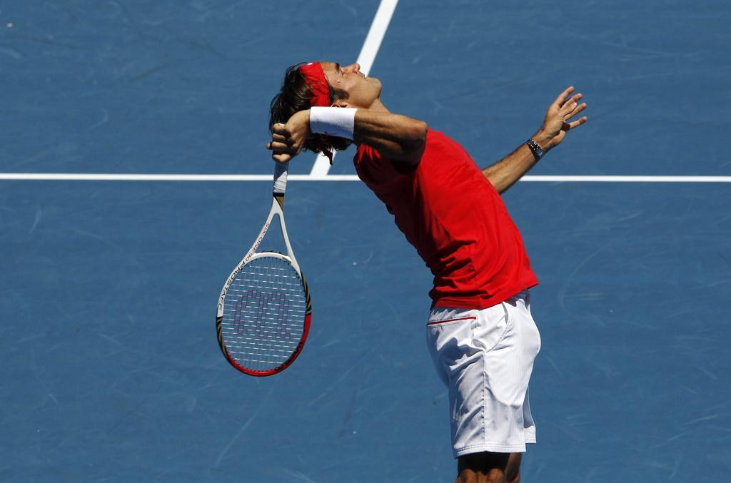 Federer a claqué 9 aces en première manche. [Barbara Walton]