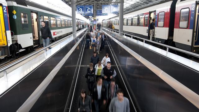 Des pendulaires à la gare de Lausanne. [Dominic Favre]