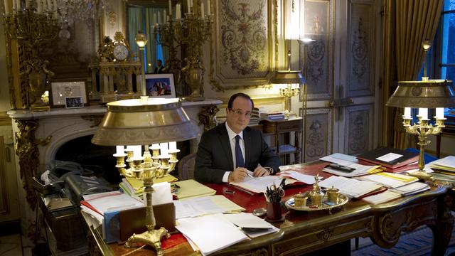 François Hollande dans son bureau de l'Elysée. [Pool - AFP - Bertrand Langlois]