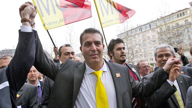 ric Stauffer à la tête de ses partisans à l'heure du résultat des élections municipales genevoises 2011. [Salvatore Di Nolfi]