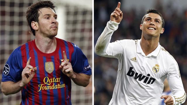 Messi et Ronaldo, le côté "bling bling" du football espagnol. [KEYSTONE - ANDREU DALMAU - BALLESTEROS]