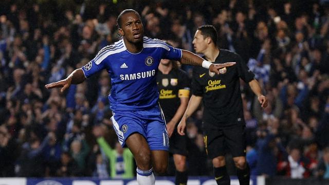 Chelsea's Didier Drogba reacts after scoring a goal against Barcelona during their Champions League semifinal first leg soccer match at Chelsea's Stamford Bridge stadium in London,Wednesday, April 18, 2012. (AP Photo/Matt Dunham) [KEYSTONE - Matt Dunham]