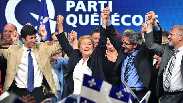 Le Parti québécois et sa cheffe de file Pauline Marois (centre) fête leur victoire. [Paul Chiasson]