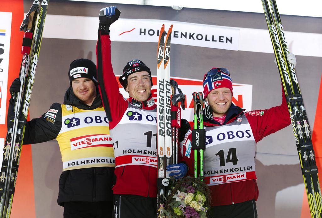 Le podium d'Oslo à fière allure avec Cologna, Roenning et Johnsrud. [KEYSTONE - Erlend Aas]