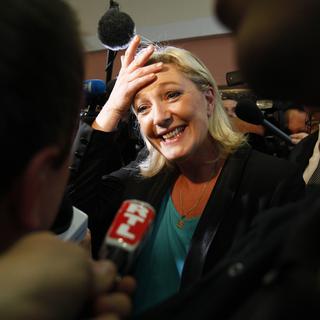 Marine Le Pen a le sourire: le Front national fait son retour à l'Assemblée avec 2 élus. [Michel Spingler]