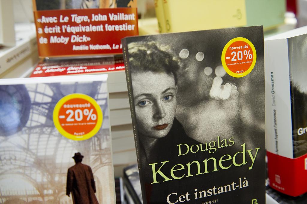 Même s'il est d'avis contraire, le Conseil fédéral est tenu légalement de soutenir le prix unique du livre, voulu par les Chambres fédérales. [KEYSTONE - Jean-Christophe Bott]