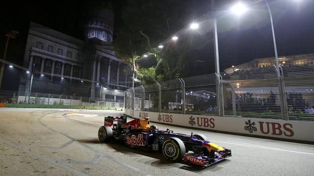 Vettel remporte pour la seconde fois consécutivement le GP de Singapour. [KEYSTONE - DIEGO AZUBEL]