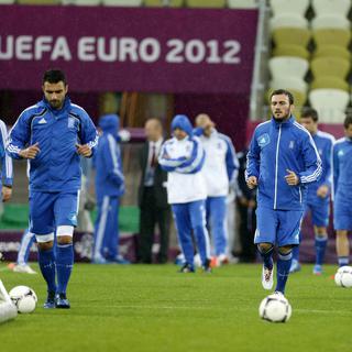 L'équipe de Grèce s'entraîne avant sa rencontre avec l'Allemagne, ce vendredi. [Thanassis Stavrakis]