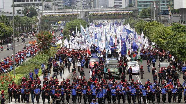 Plusieurs milliers de personnes ont participé au traditionnel défilé du 1er mai à Djakarta. [Achmad Ibrahim]