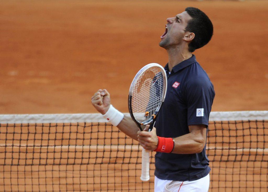 Djokovic vise son premier titre à Roland-Garros pour sa première finale. [KEYSTONE - YOAN VALAT]