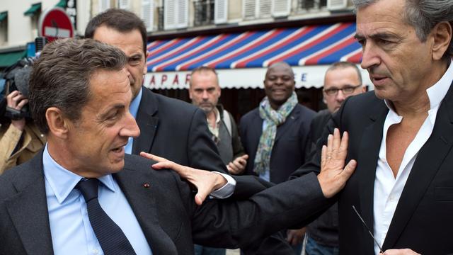 Nicolas Sarkozy, ici en compagnie de Bernard-Henri Lévy, donne des leçons à François Hollande sur la Syrie.