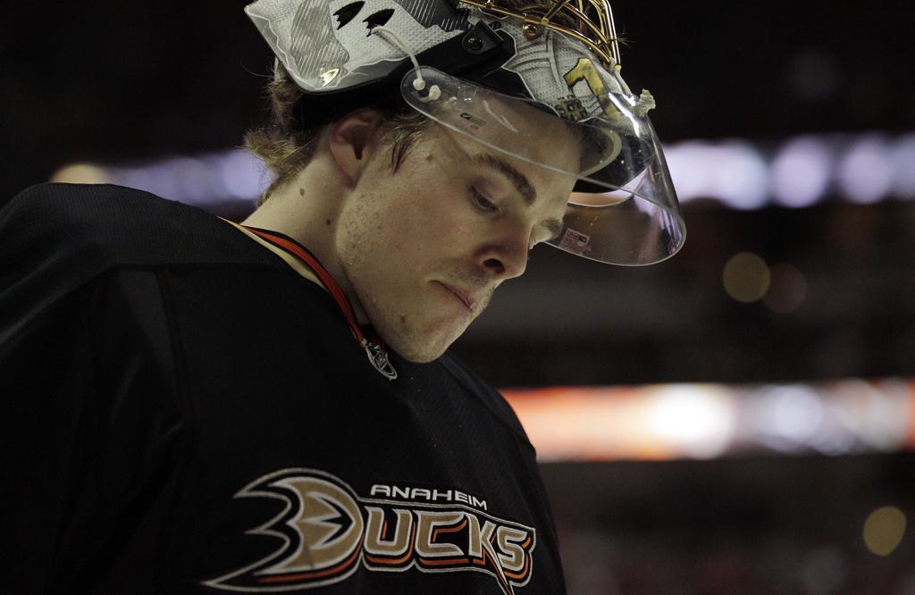 Anaheim Ducks goalie Jonas Hiller looks down while playing the Buffalo Sabres during the first period of an NHL hockey game in Anaheim, Calif., Wednesday, Feb. 29, 2012. (AP Photo/Gregory Bull) [Gregory Bull]