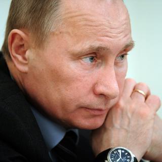 Selon Vladimir Poutine, les leaders de l'opposition sont prêts à toutes les dérives pour lui barrer la route. [Alexei Druzhinin]