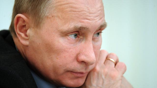 Selon Vladimir Poutine, les leaders de l'opposition sont prêts à toutes les dérives pour lui barrer la route. [Alexei Druzhinin]