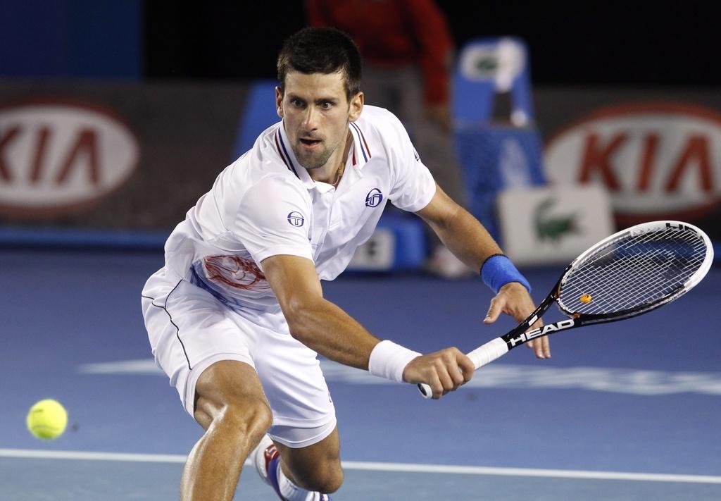 Novak Djokovic estime que cette demi-finale contre Murray est l'un des plus beaux de sa carrière. [KEYSTONE - How Hwee Young]