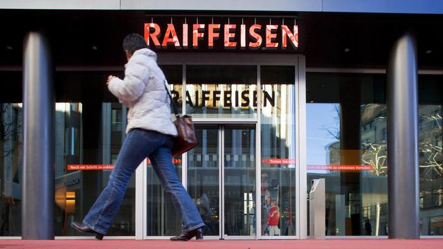 Le groupe coopératif Raiffeisen s'est notamment allié aux banques cantonales et à la banque Migros. [Gaetan Bally]