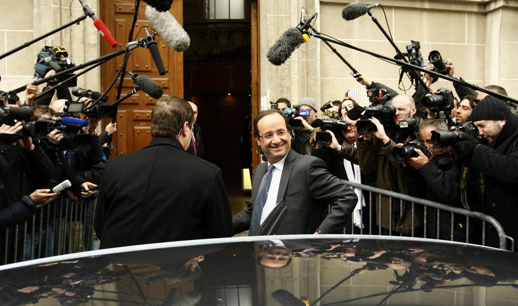 Les sondages donnent François Hollande vainqueur au 2e tour, mais le score de Marine Le Pen laisse planer un doute. [KEYSTONE - AP Photo/Michel Spingler]