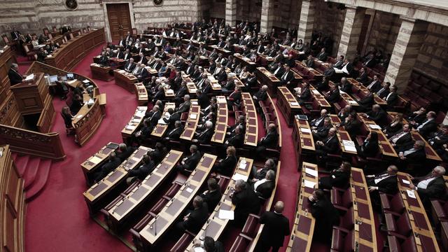 Le Parlement grec a approuvé tard dimanche soir le plan d'austérité voulu par l'UE et le FMI. [AFP]